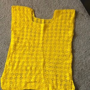 Yellow knitted sleeve less shirt